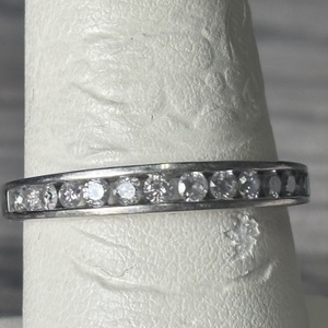  10 K WHITE GOLD DIAMOND WEDDING BAND. 