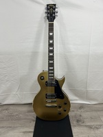 Vintage V100 ICON Electric Guitar ~ Distressed HH Gold Top W Gator gig bag