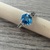  14 k white gold blue topaz ring 